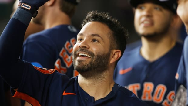 Sep 5, 2023; Arlington, Texas, USA; Houston Astros second baseman Jose Altuve (27) is congratulated by his teammates after hitting a solo home run in the first inning against the Texas Rangers at Globe Life Field. Mandatory Credit: Tim Heitman-USA TODAY Sports  